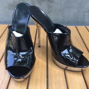 Like new Gucci black and metallic clogs.